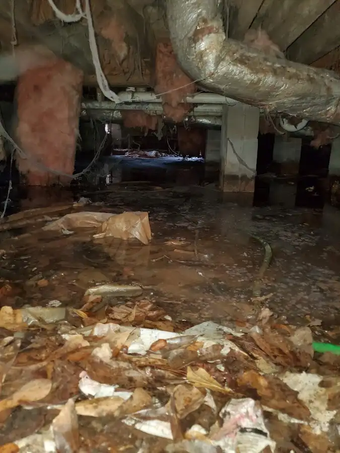 Crawl space flood assessment for Commercial Water Damage Restoration in Grinnell