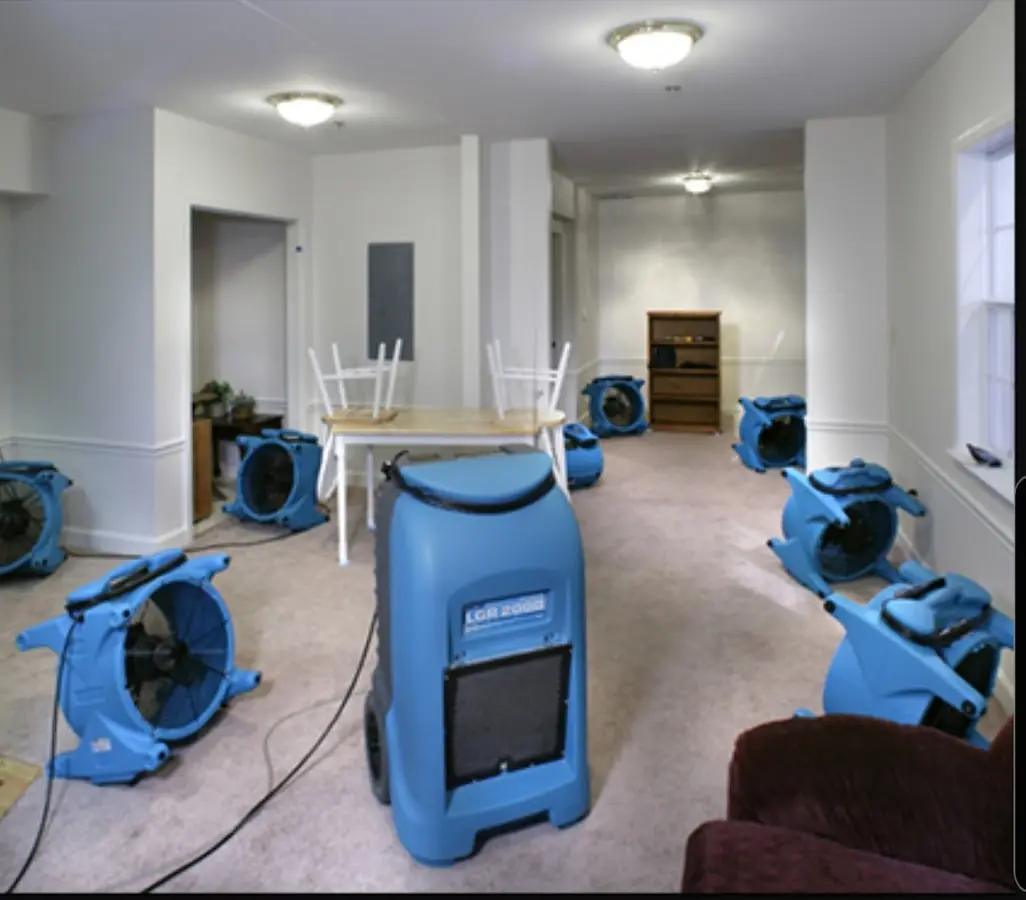 Air movers and dehumidifier setup for Water Extraction & Removal in Grinnell